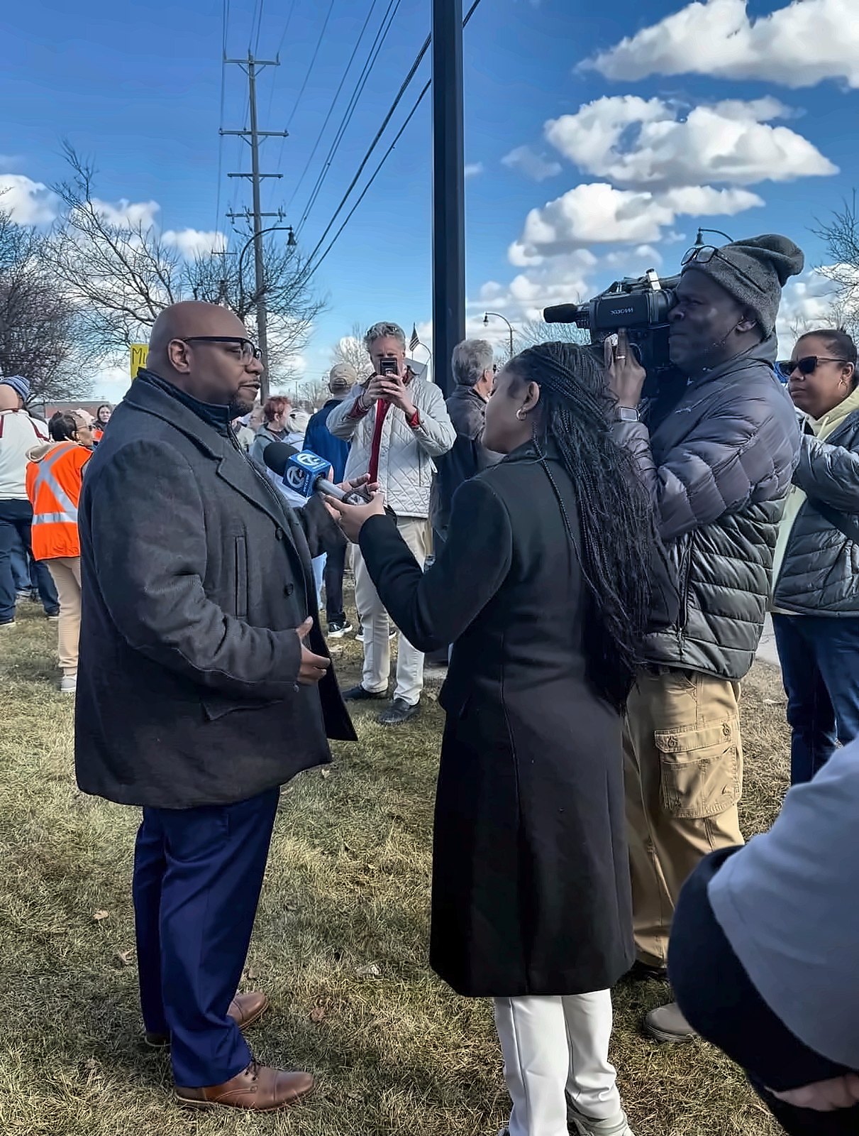 Kermit Williams being interviewed by a WXYZ Channel 7 reporter outdoors